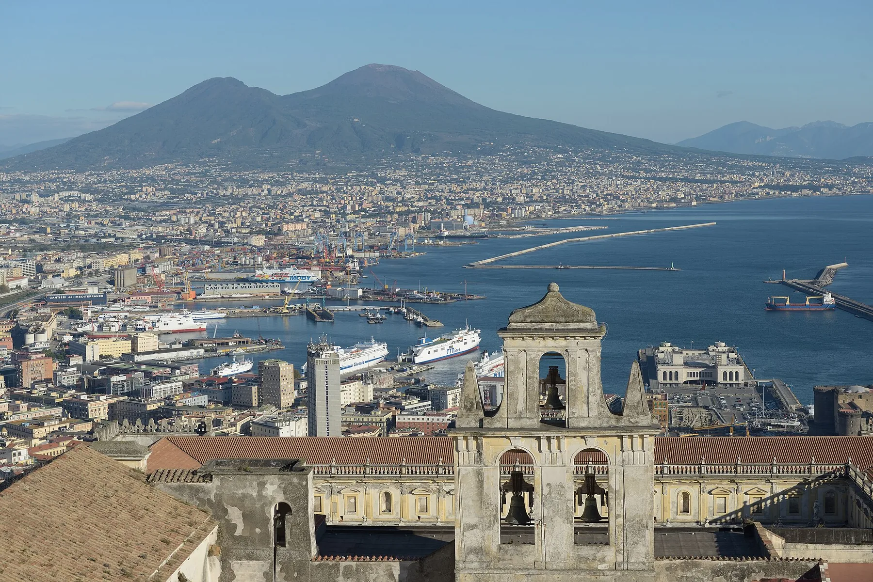 Naples from the Castello Sant Elmo with Abbazia San Martino the port and the Vesuv.jpg