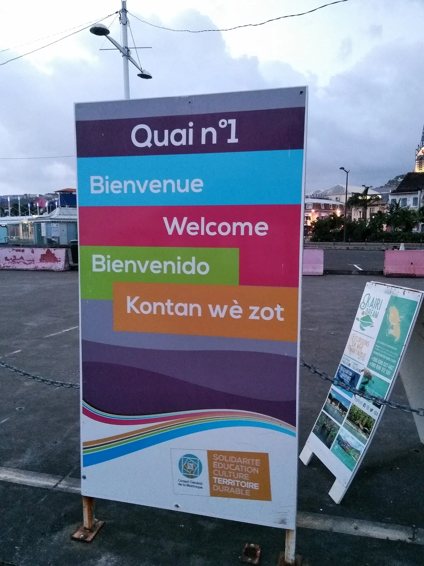 Multilingual sign on a dock in Fort-de-France.jpg